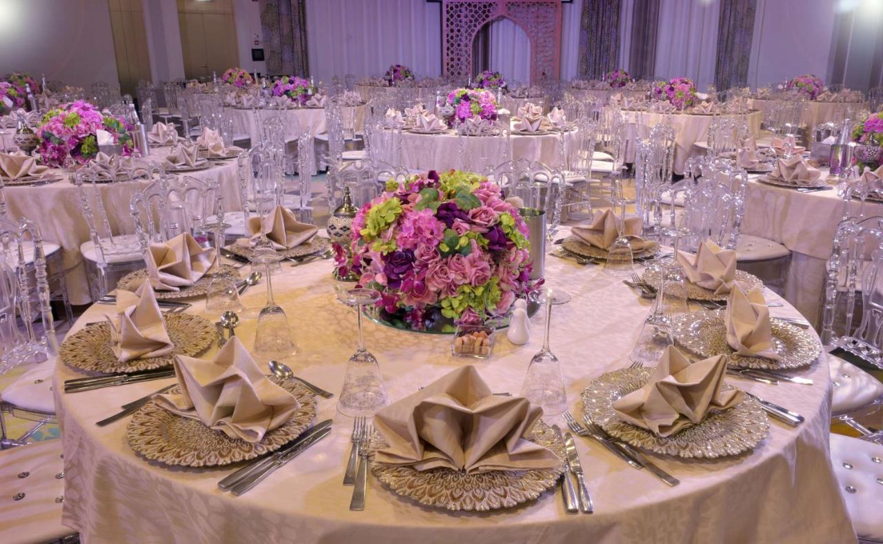 Symphony Style Hotel Kuwait Salmiya 외부 사진 A table set for a formal dinner